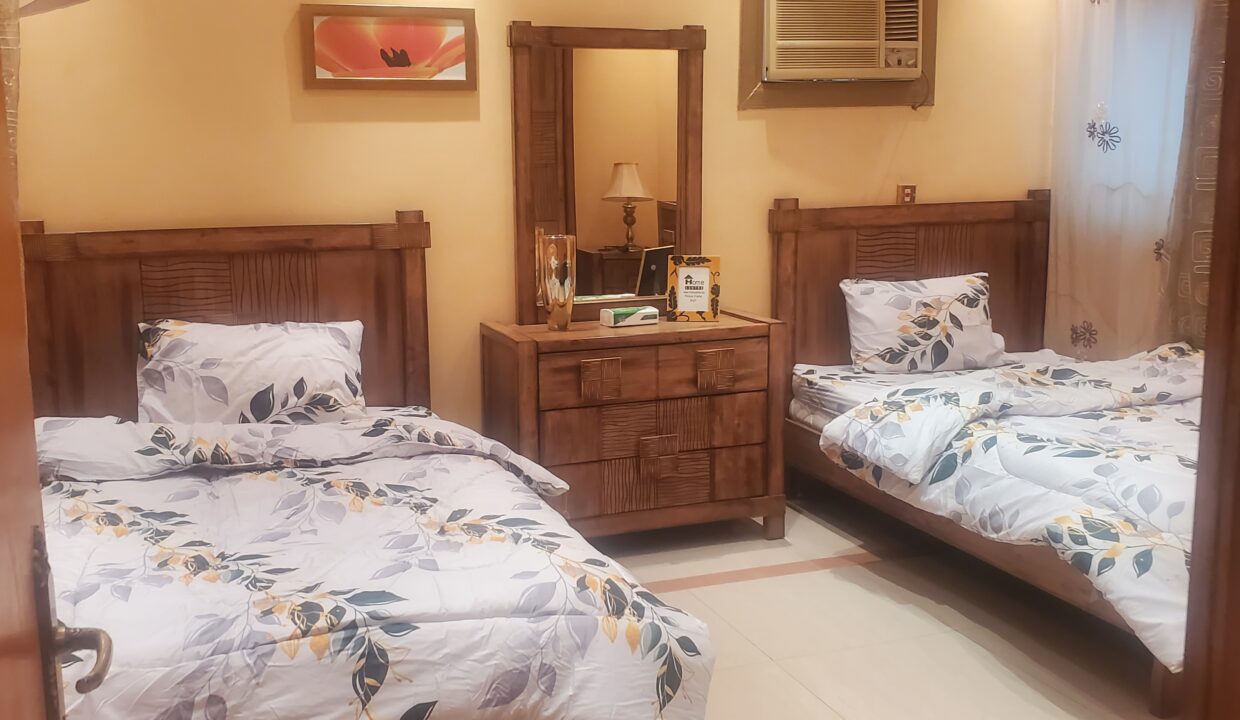 غرفة نوم سريرين